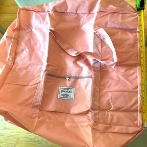 2 PACK BUNDLE DUFFLE BAGS ONE PINK ONE BLACK NEW IN PACKAGE W LUGGAGE SLEEVE